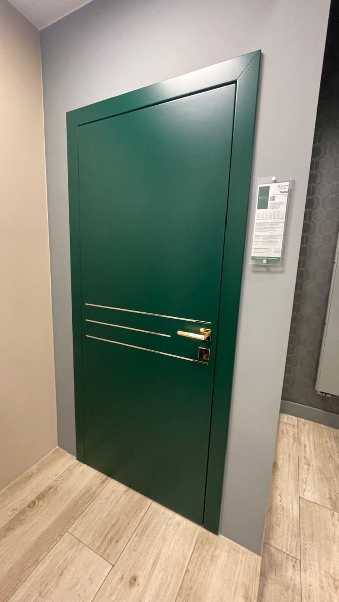 Porte POL-SKONE laquée vert, inserts dorés